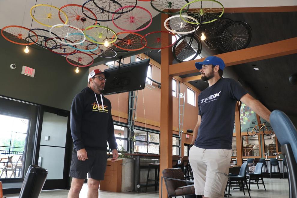 Co-owners of Bodihow Brewing Company Jamie Bush and McCann Schroeder, converse inside the business, which is opening soon.EMILIE HEIDEMANN, STATE JOURNAL