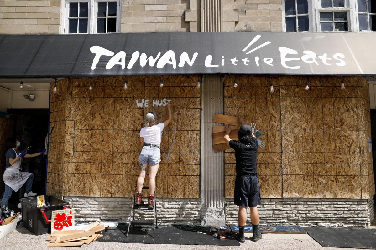 On State Street Fresh Murals Brighten Boarded Storefronts Local News Madison Com