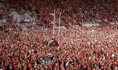 Fans rush field at Camp Randall