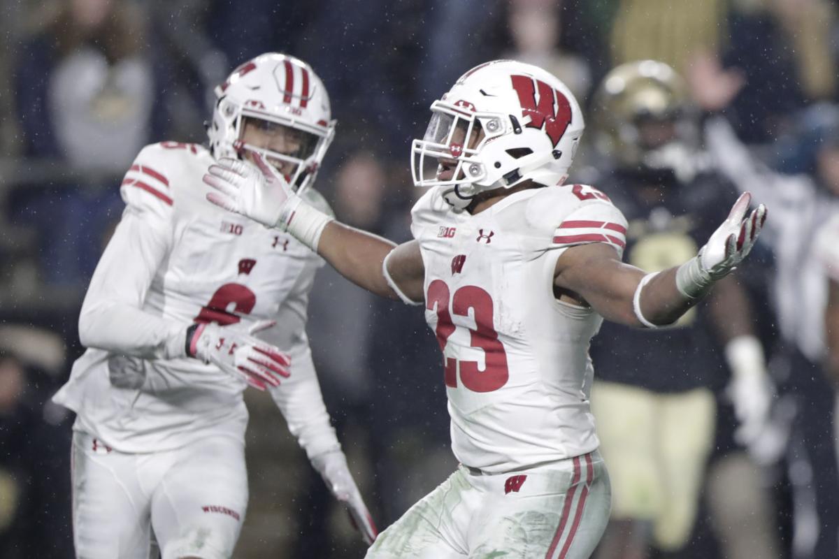 Badgers Running Back Jonathan Taylor Left Guard Michael Deiter