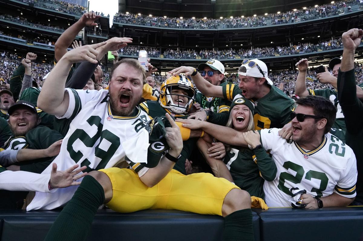 Packers escape Patriots in overtime at Lambeau Field