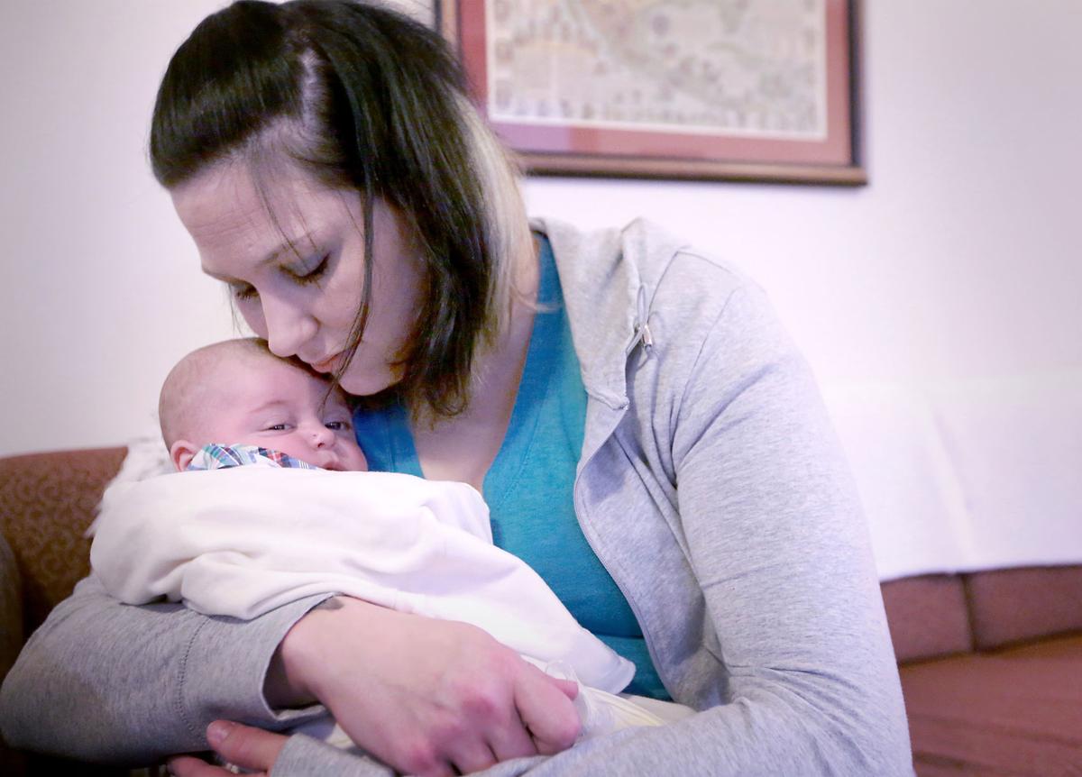Anne holding James
