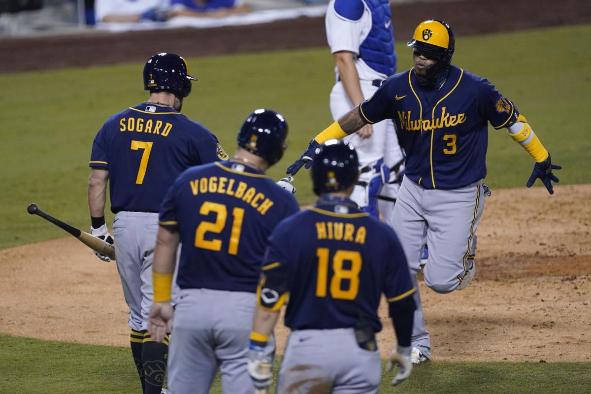 Ryan Braun and Eric Sogard report, giving the Brewers a full squad.