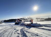 Grooming the snowmobile trail