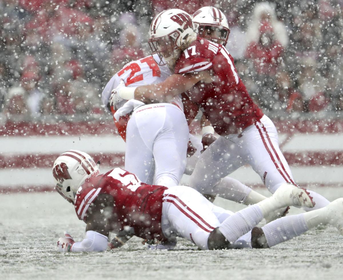 Andrew Van Ginkel tackles Illinois' Ra'Von Bonner