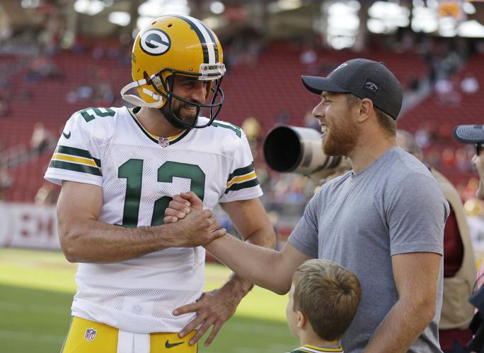 Aaron Rodgers throws a TD pass in his brief preseason debut as