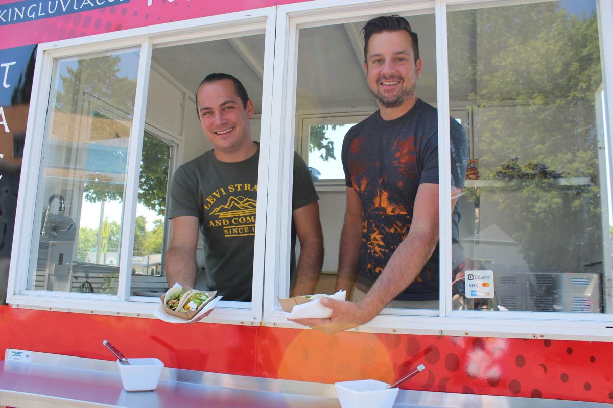 Sam Eifert and Jason Whitley at their Kingluv Tacos cart in Stoughton .JPG
