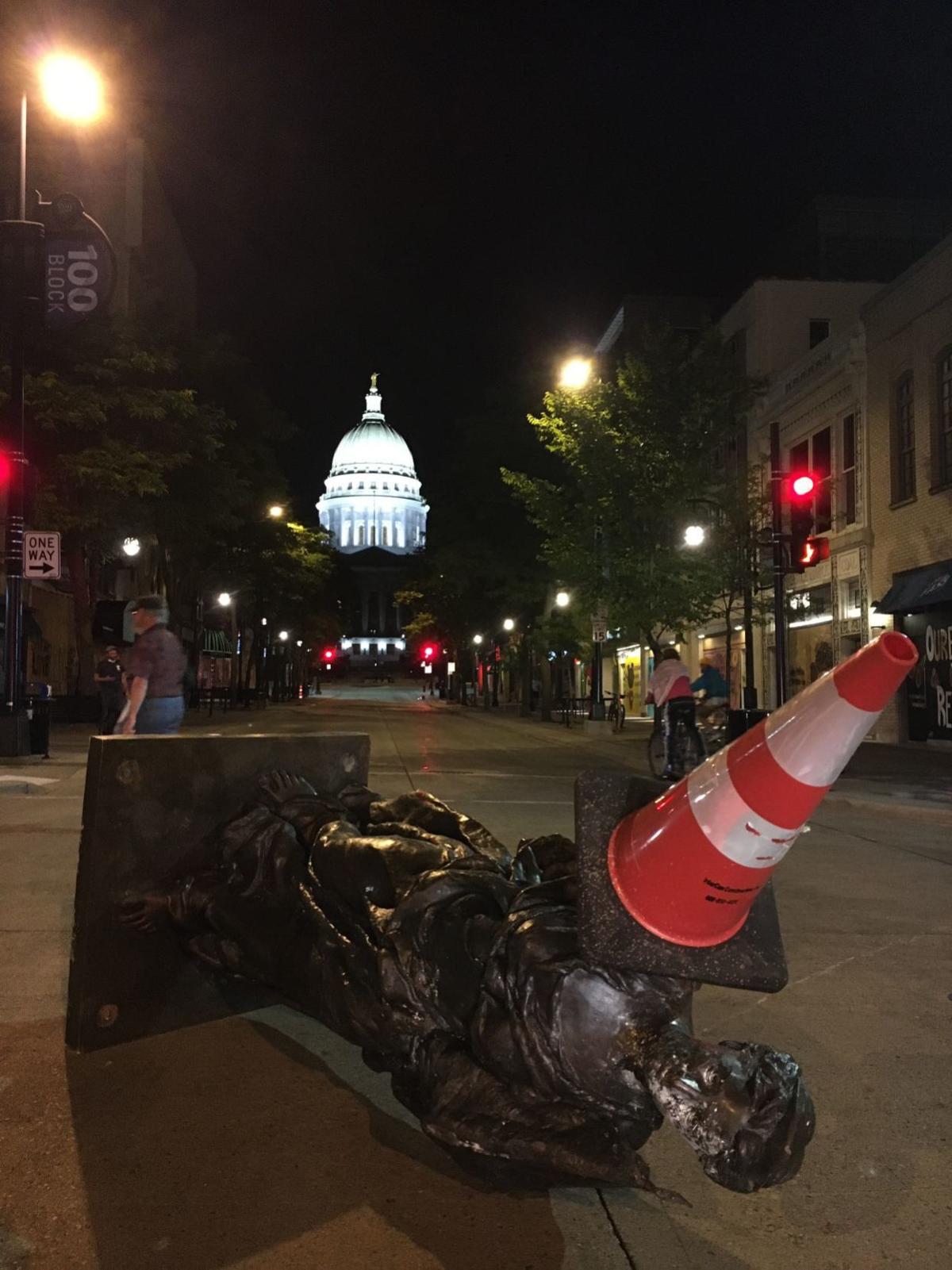 Protesters take down statues outside Capitol following controversial