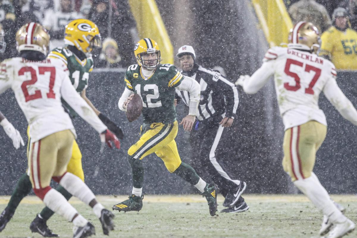 GREEN BAY, WI - DECEMBER 19: Green Bay Packers defensive tackle Jarran Reed  (90) celebrates during a game between the Green Bay Packers and the Los  Angeles Rams on December 19, 2022