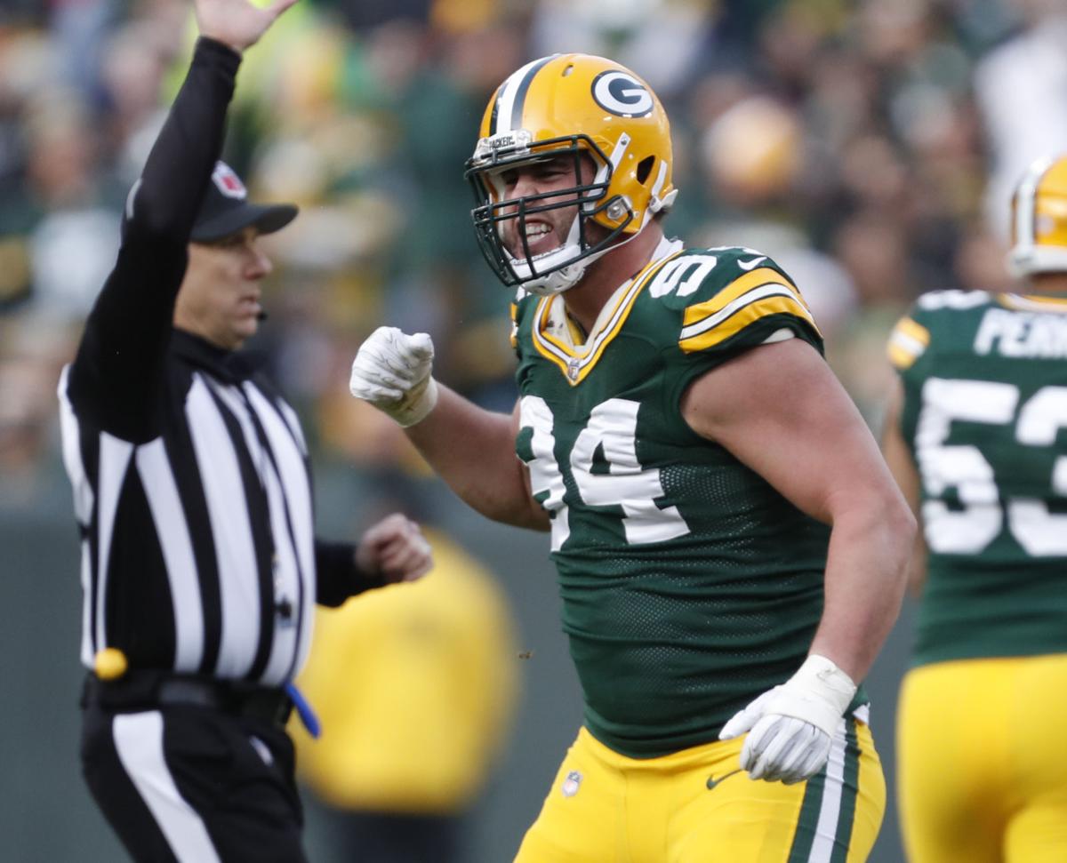 With new extension and expanded role, Dean Lowry becomes one of the  'pillars' of Packers' defense