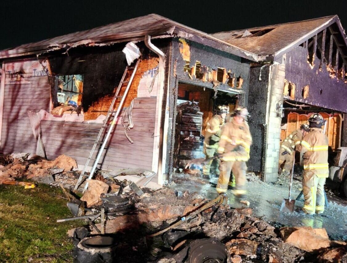 Person taken to hospital after garage fire in Columbus