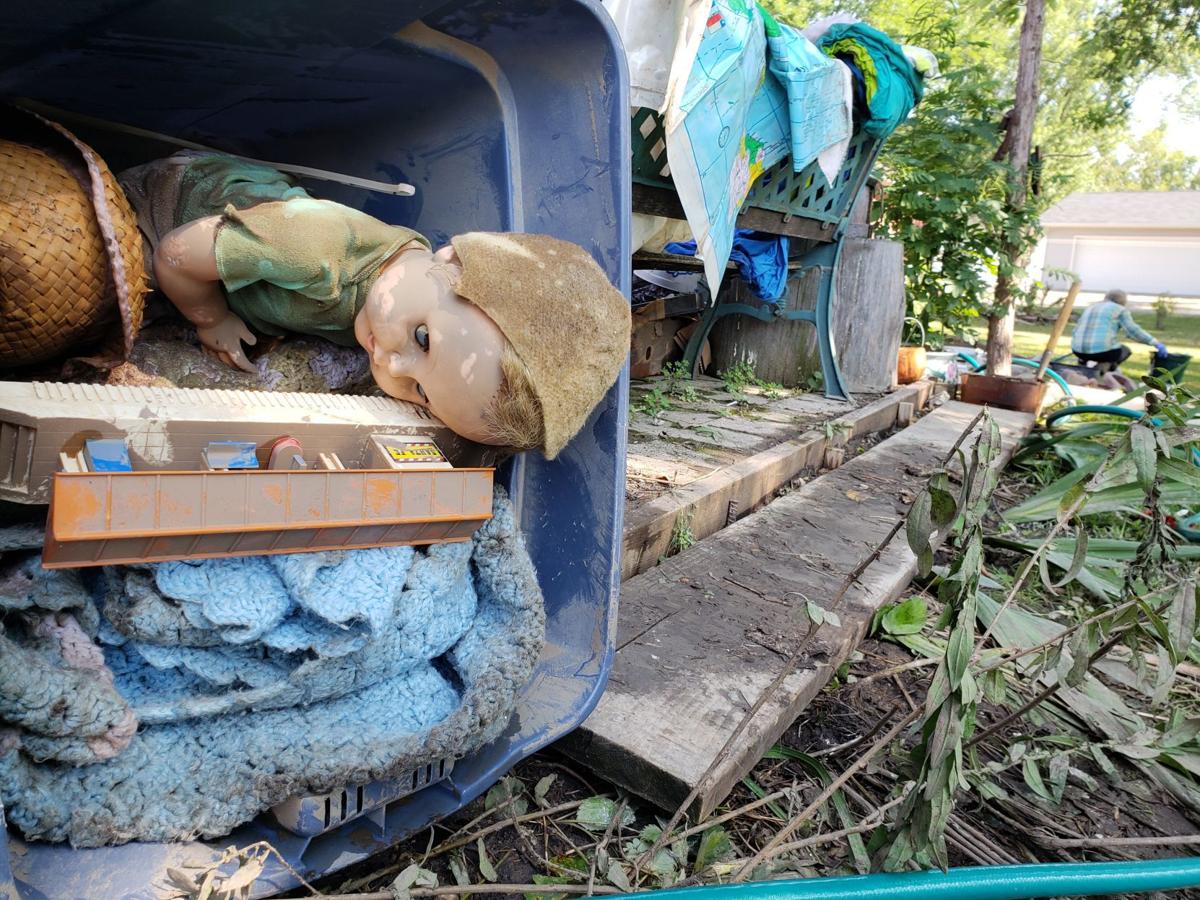 Mazomanie residents assess and address widespread flood damage