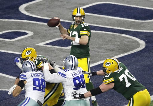 Aaron Rodgers delivers key block as Packers upend Cowboys in OT