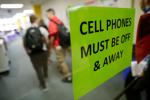 OUR VIEW: Dear parents, help hang up cellphones at school