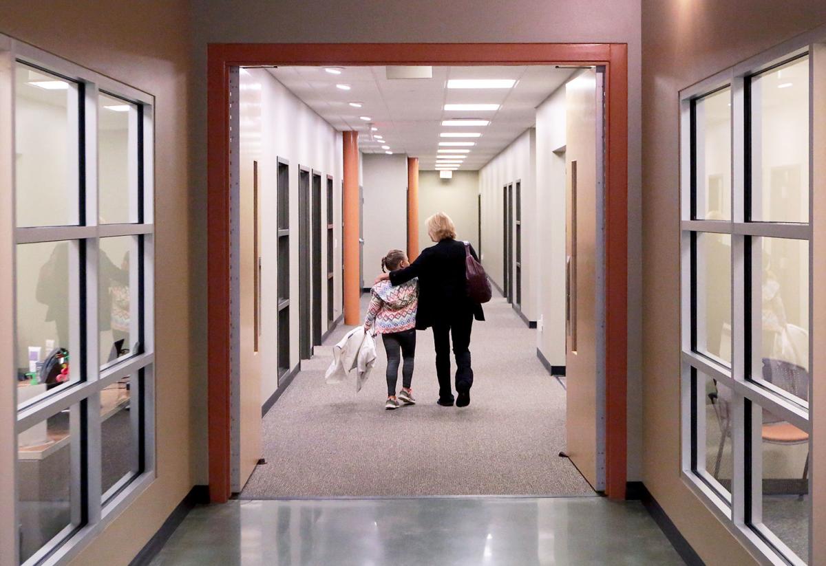 Donna and Natalie walking down hallway (copy)