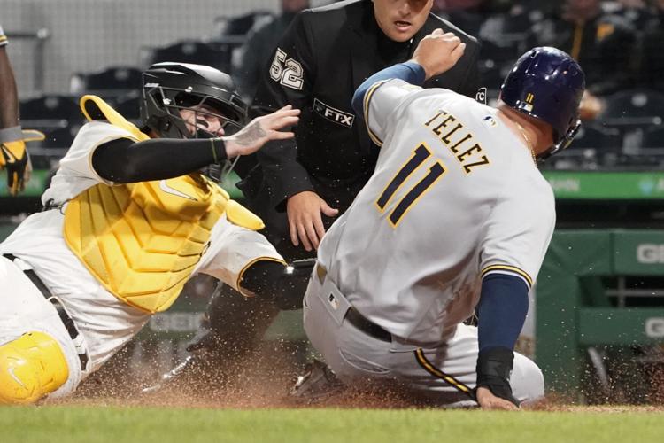 McCutchen rallies Brewers past Pirates 3-2 to complete sweep