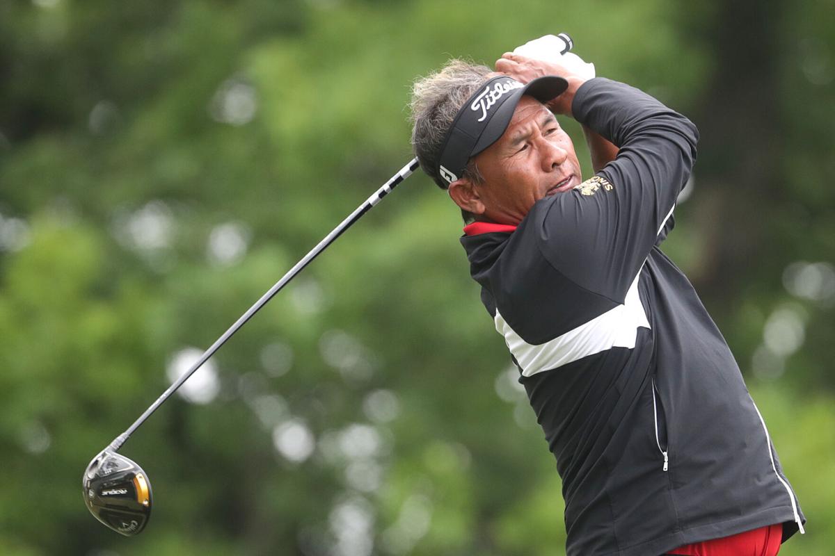 MADISON, WI - JUNE 11: Former Yankee baseball player Derek Jeter enjoys a  laugh with fans during the second round of the American Family Insurance  Championship Champions Tour golf tournament on June