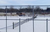 Grooming the snowmobile trail