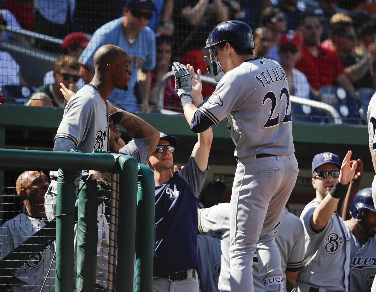 Hothitting Christian Yelich's grand slam highlights Brewers' victory