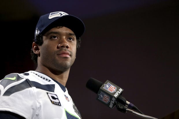 Russell Wilson starring solo in Super Bowl ad for American Family