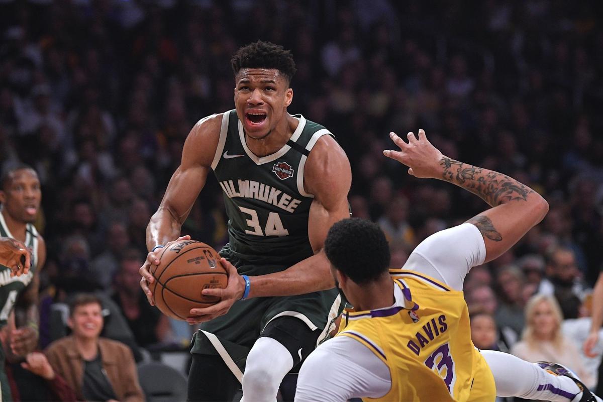 Giannis Antetokounmpo, Anthony Davis, AP file photo