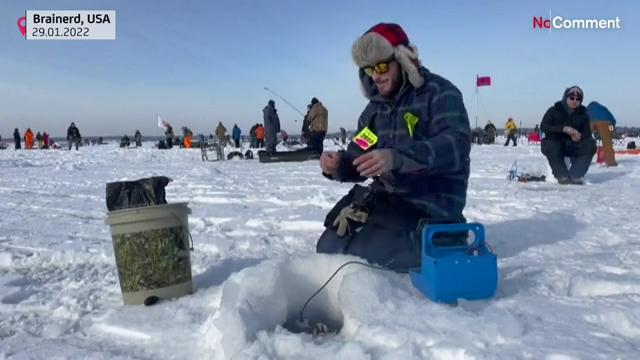 Nearly 10 000 anglers attend world s largest charitable ice fishing contest