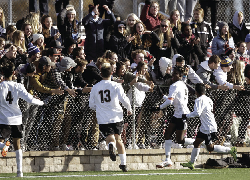 WIAA state boys soccer photo: Oregon players celebrate a goal