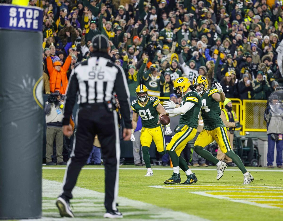 GREEN BAY, WI - DECEMBER 19: Green Bay Packers defensive tackle Jarran Reed  (90) celebrates during a game between the Green Bay Packers and the Los  Angeles Rams on December 19, 2022