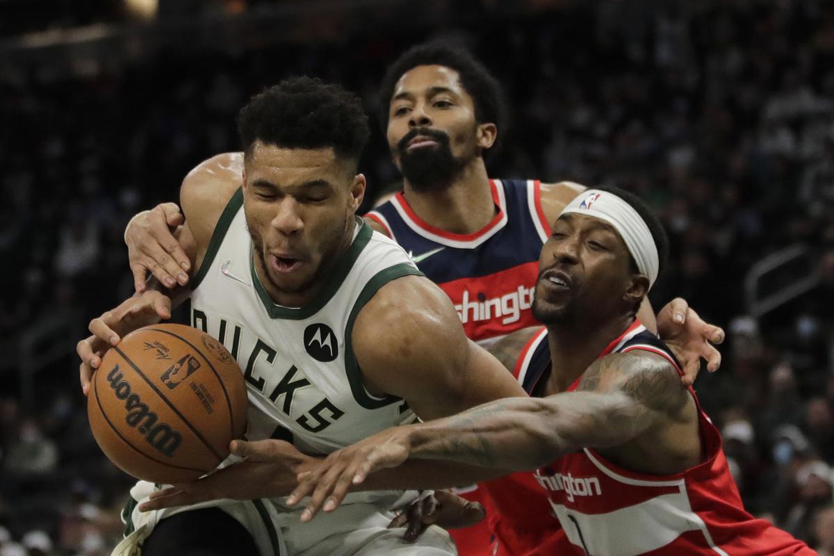 Behind Giannis Antetokounmpo's triple-double, Bucks beat Wizards after  losing big lead