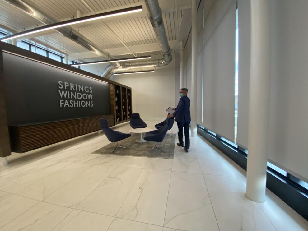 Springs Window Fashions completes expansion and gets a new owner