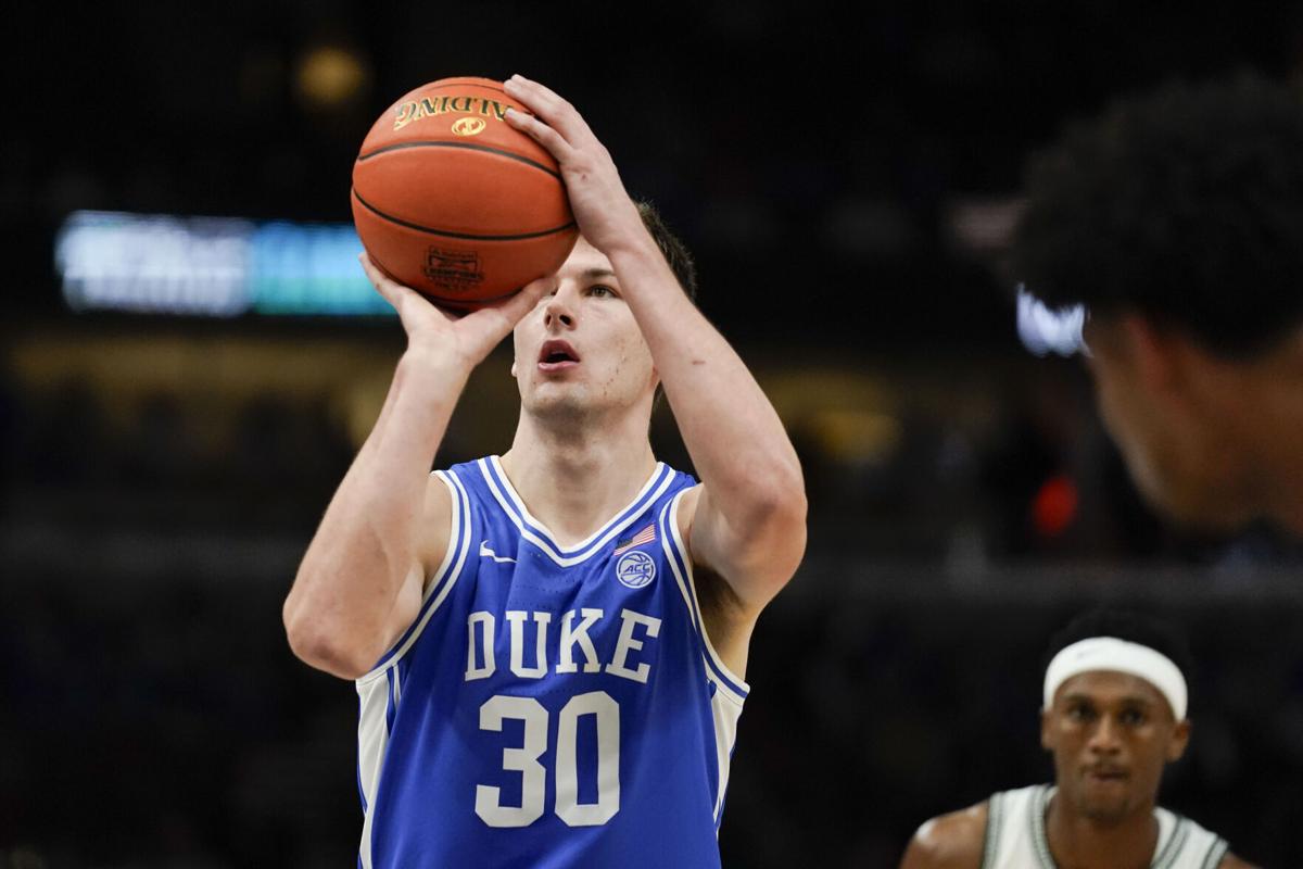 Foster, Filipowski lead way as Duke beats Michigan St.