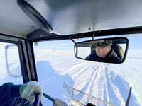 Grooming the snowmobile trail