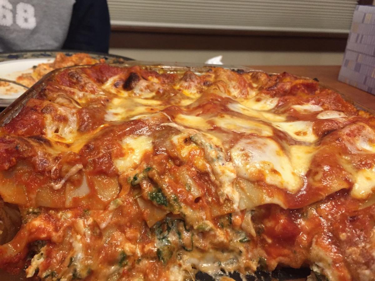 Lasagna closeup with tissues and son.jpeg