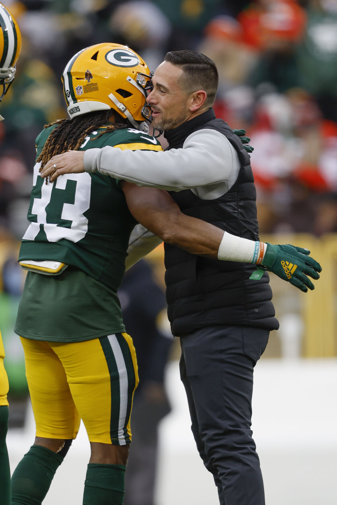 Green Bay Packers' Randall Cobb makes snow angel in end zone