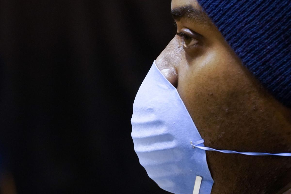 Man wearing mask, AP generic file photo