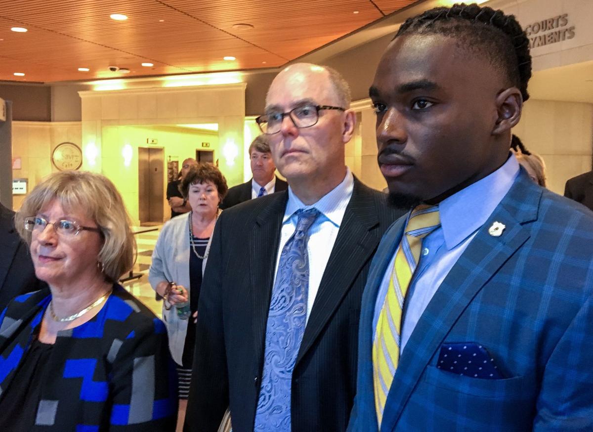 Quintez Cephus in court with lawyers