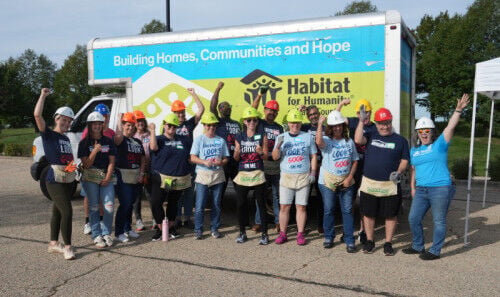 A parking lot full of possibility: American Family Insurance builds with Habitat Dane
