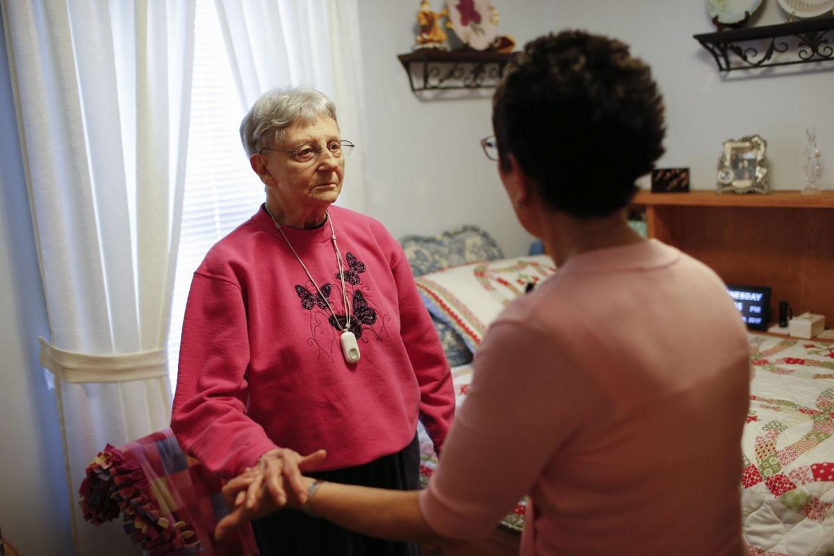 Martha Hays, left, works July 19 with nurse Sandy Miller (copy)