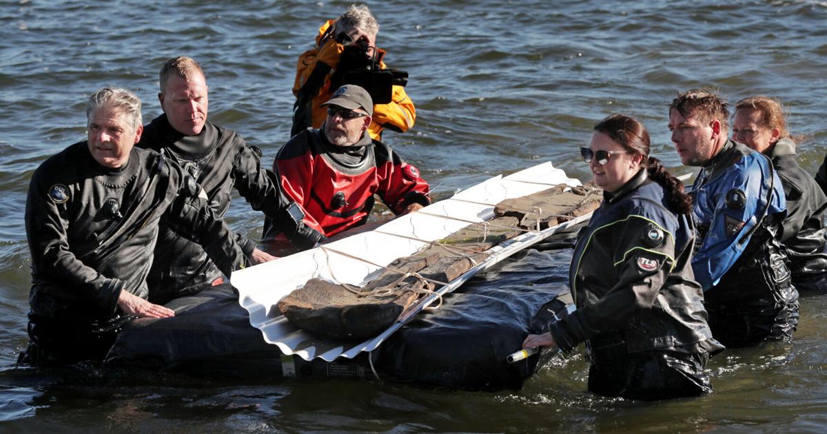 Second ancient canoe is pulled from lake's depths