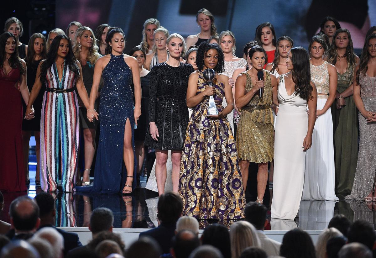 Host Danica Patrick, Sarah Klein, Tiffany Thomas Lopez, Aly Raisman and recipients of the Arthur Ashe Award for Courage speak onstage at the ESPYS on July 18, 2018, at Microsoft Theater in Los Angeles. (Kevork Djansezian/Getty Images/TNS) **FOR USE WITH THIS STORY ONLY**