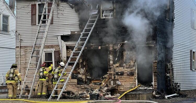 Person injured, dog killed in house fire on North Side