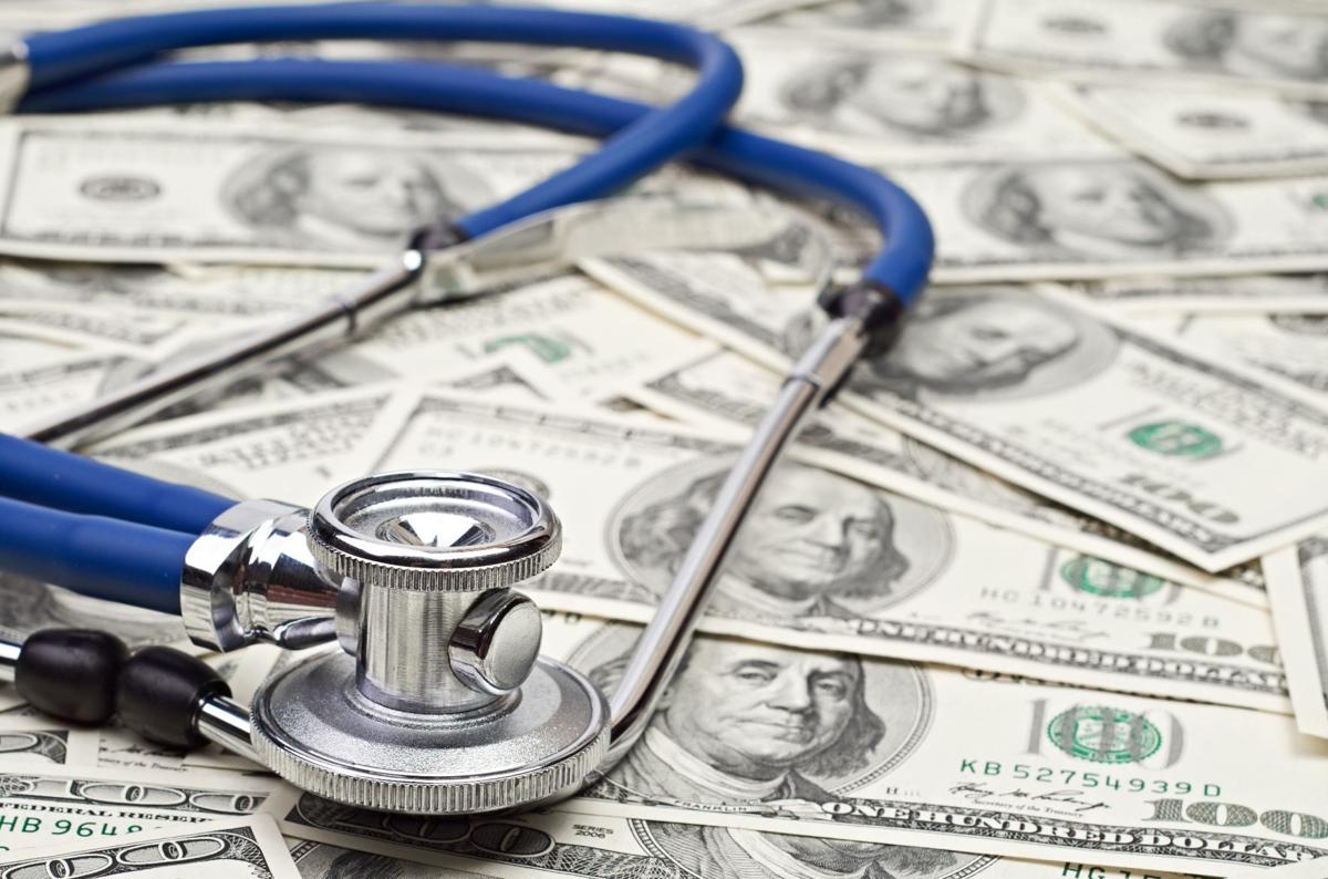 Stethoscope and money (copy) (copy) (copy)