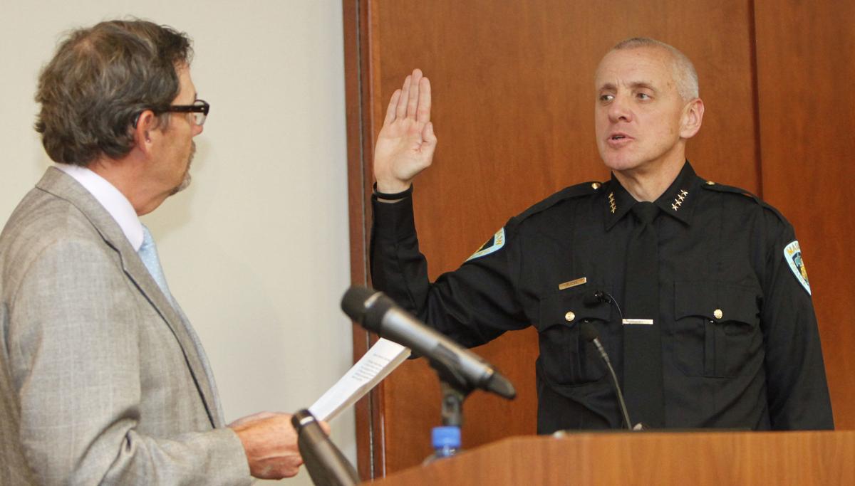 Kamperschroer swears in Koval in 2014