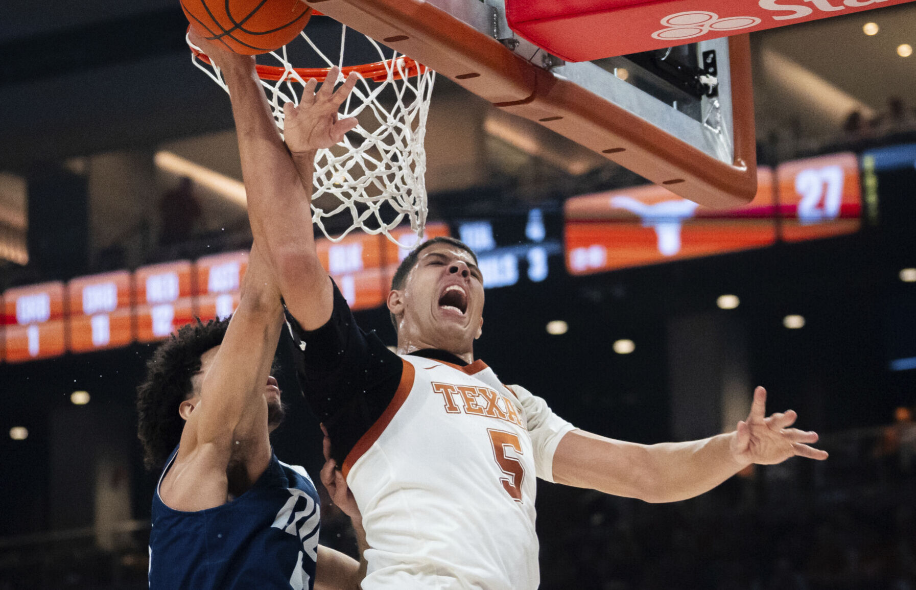 Hunter scores 18 to power No. 19 Texas past Rice BVM Sports
