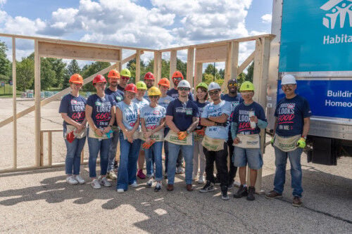 A parking lot full of possibility: American Family Insurance builds with Habitat Dane