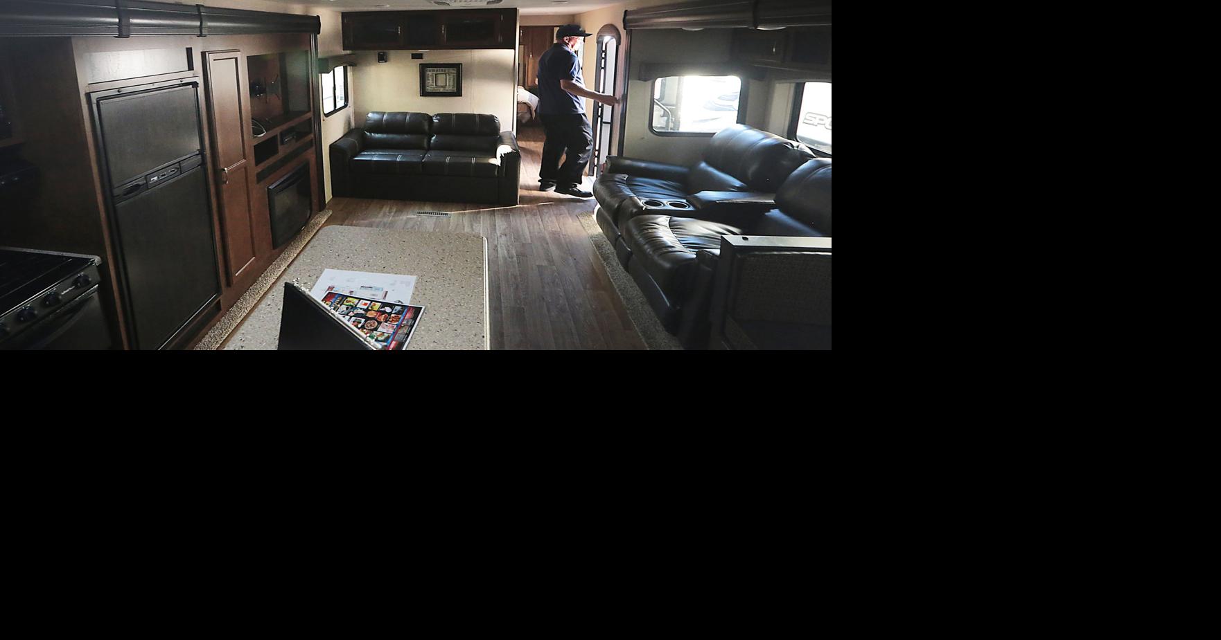Here are inside of RVs at 2023 RV Show in Milwaukee's Wisconsin Center