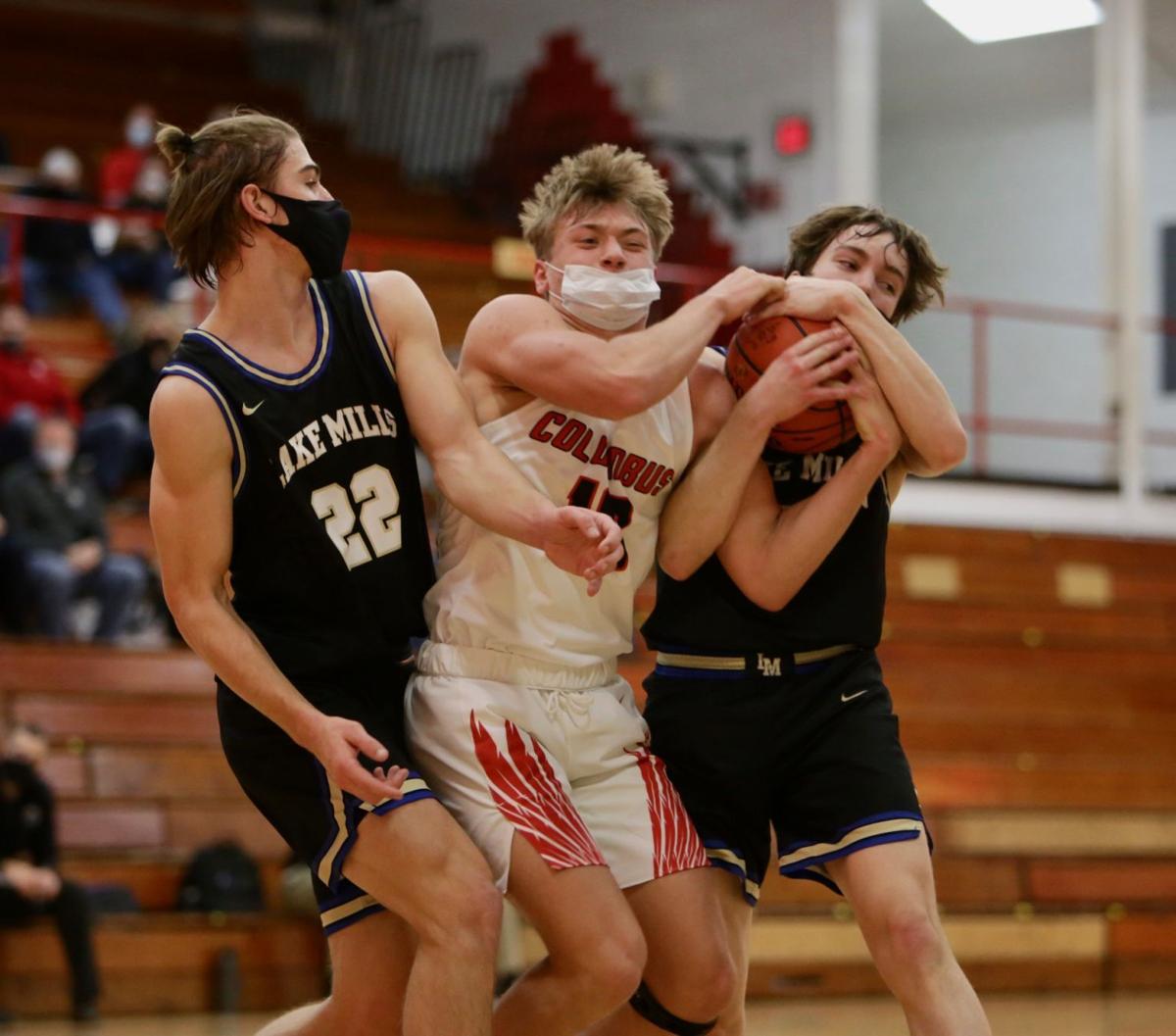 Prep boys basketball photo: Lake Mills' Adam Moen and Ethan Foster