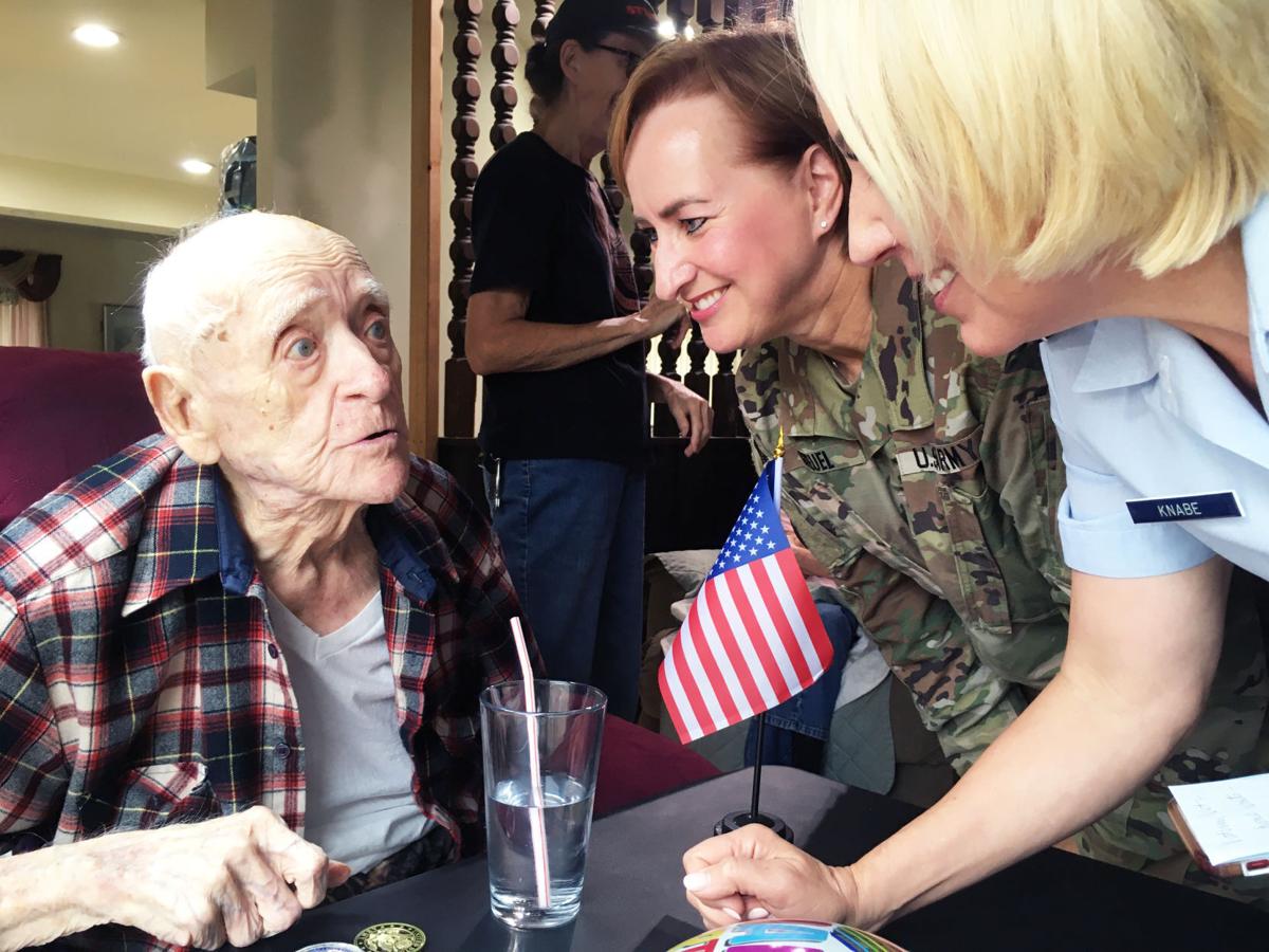 Roland 'Bud' Pater turns 106 with visitor from VA representatives