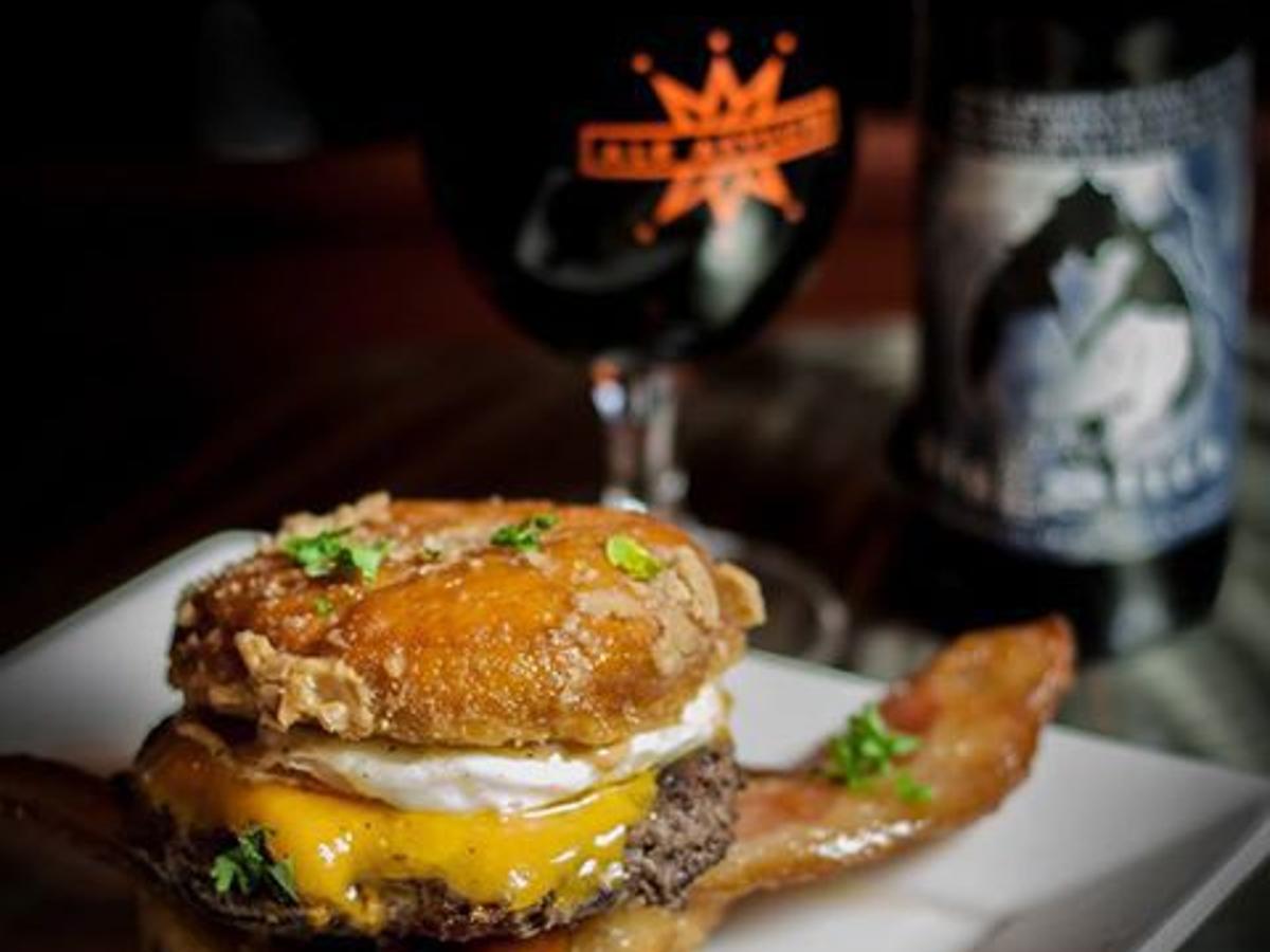 Yeah I Ate That The Ale Asylum Hurts Donut Burger Piles On The