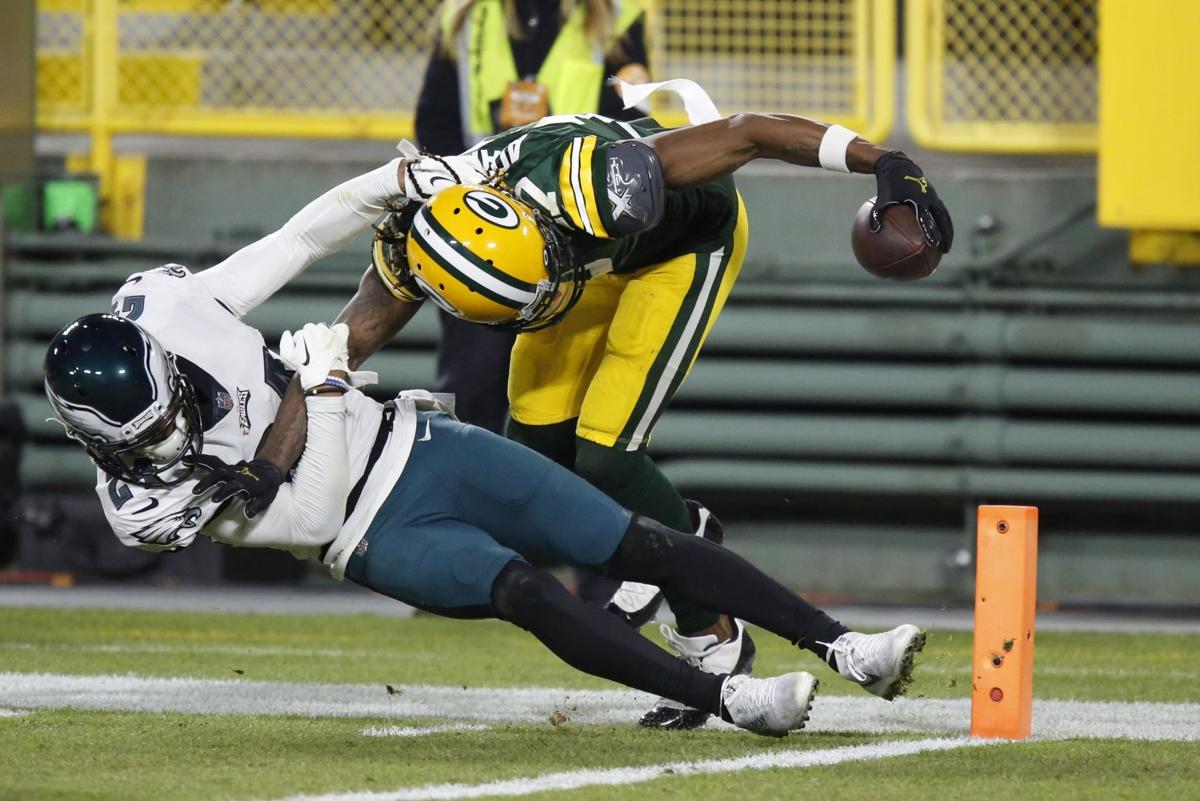 Davante Adams gives Aaron Rodgers more than his 400th TD pass in Packers'  30-16 win over Eagles